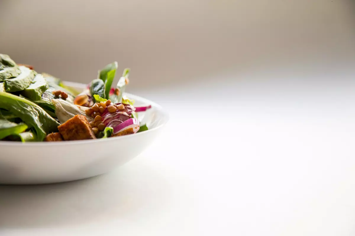 A fresh salad in a white bowl